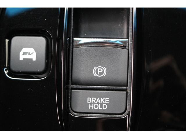 ステップワゴンスパーダ ｅ：ＨＥＶスパーダ　Ｇ　ホンダセンシング　ＭＯＰ１０型ナビ／両側電動スライドドア／衝突軽減ブレーキ／地デジ／バックカメラ／ＥＴＣ２．０／ＬＥＤ／純正１６インチアルミホイール／プッシュスタート／スマートキー／（70枚目）