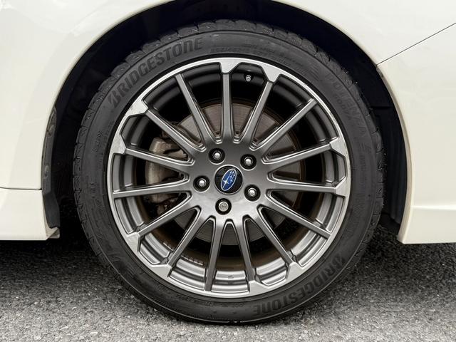 レヴォーグ ２．０ＳＴＩスポーツアイサイト　純正８インチナビ　バックカメラ　フルセグ　アイサイトバージョン３　アダクティブクルーズコントロール　アドバンスドセーフティパッケージ　シートヒーター　ＥＴＣ　メモリー機能付きパワーシート　サイドビュー（21枚目）