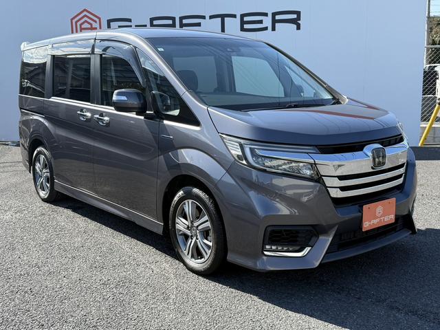 ステップワゴンスパーダ スパーダハイブリッド G ホンダセンシング 禁煙車 1オーナー 純正10インチナビ 後席モニター バックカメラ フルセグ 両側電動スライド 7人乗リ 衝突軽減ブレーキ ダダクティブクルーズ わくわくゲート デュアルエアコン レーンキープアシスト(9枚目)