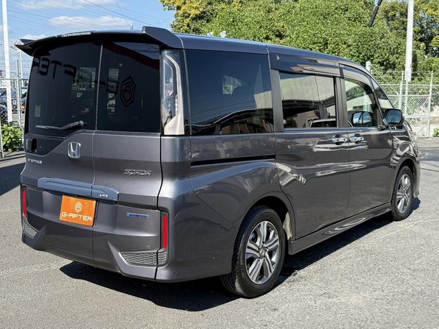 ステップワゴンスパーダ スパーダハイブリッド G ホンダセンシング 禁煙車 1オーナー 純正10インチナビ 後席モニター バックカメラ フルセグ 両側電動スライド 7人乗リ 衝突軽減ブレーキ ダダクティブクルーズ わくわくゲート デュアルエアコン レーンキープアシスト(11枚目)