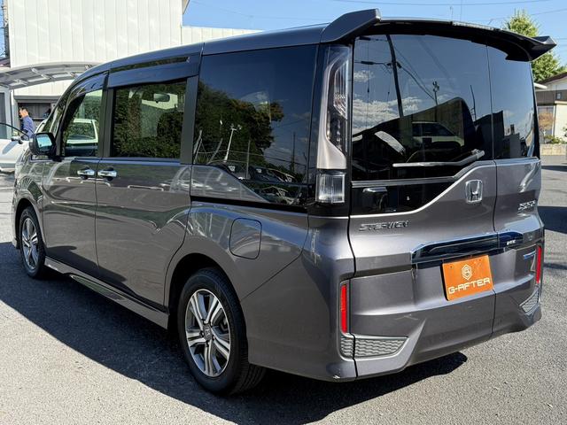 ステップワゴンスパーダ スパーダハイブリッド G ホンダセンシング 禁煙車 1オーナー 純正10インチナビ 後席モニター バックカメラ フルセグ 両側電動スライド 7人乗リ 衝突軽減ブレーキ ダダクティブクルーズ わくわくゲート デュアルエアコン レーンキープアシスト(13枚目)