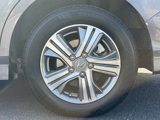 ステップワゴンスパーダ スパーダハイブリッド G ホンダセンシング 禁煙車 1オーナー 純正10インチナビ 後席モニター バックカメラ フルセグ 両側電動スライド 7人乗リ 衝突軽減ブレーキ ダダクティブクルーズ わくわくゲート デュアルエアコン レーンキープアシスト(26枚目)