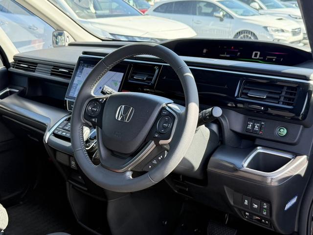 ステップワゴンスパーダ スパーダハイブリッド G ホンダセンシング 禁煙車 1オーナー 純正10インチナビ 後席モニター バックカメラ フルセグ 両側電動スライド 7人乗リ 衝突軽減ブレーキ ダダクティブクルーズ わくわくゲート デュアルエアコン レーンキープアシスト(39枚目)