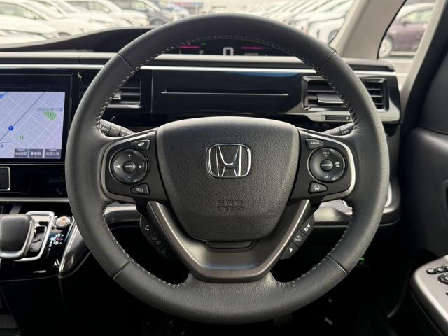 ステップワゴンスパーダ スパーダハイブリッド G ホンダセンシング 禁煙車 1オーナー 純正10インチナビ 後席モニター バックカメラ フルセグ 両側電動スライド 7人乗リ 衝突軽減ブレーキ ダダクティブクルーズ わくわくゲート デュアルエアコン レーンキープアシスト(50枚目)