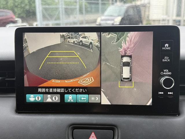 ヴェゼル ｅ：ＨＥＶ　Ｚ　禁煙車　純正９インチナビ　１０スピーカー　マルチビューカメラ　フルセグ　電動リアゲート　アダクティブクルーズコントロール　衝突軽減　ハーフレザー　シートヒーター　ステアリングヒーター　ＥＴＣ（5枚目）