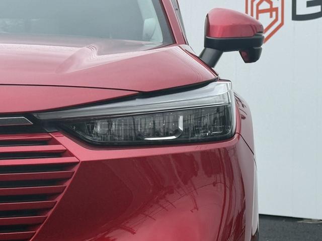 ヴェゼル ｅ：ＨＥＶ　Ｚ　禁煙車　純正９インチナビ　１０スピーカー　マルチビューカメラ　フルセグ　電動リアゲート　アダクティブクルーズコントロール　衝突軽減　ハーフレザー　シートヒーター　ステアリングヒーター　ＥＴＣ（13枚目）