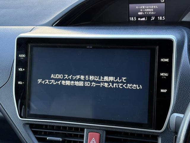 ノア ハイブリッドＳｉ　禁煙車　純正１０．５インチナビ　後席モニター　両側電動スライドドア　寒冷地仕様　リアオートエアコン　バックカメラ　７人乗り　衝突軽減ブレーキ　純正１６インチＡＷ　シートヒーター　ＥＴＣ　ハーフレザー（3枚目）