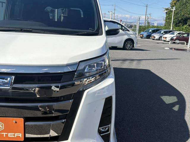 ノア ハイブリッドＳｉ　禁煙車　純正１０．５インチナビ　後席モニター　両側電動スライドドア　寒冷地仕様　リアオートエアコン　バックカメラ　７人乗り　衝突軽減ブレーキ　純正１６インチＡＷ　シートヒーター　ＥＴＣ　ハーフレザー（16枚目）