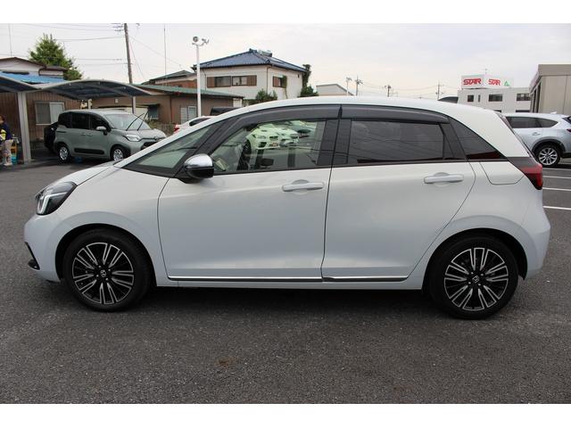 フィット ｅ：ＨＥＶリュクス　禁煙車　純正９インチナビ　バックカメラ　茶革ハーフレザー　シートヒーター　衝突軽減ブレーキ　アダクティブクルーズ　レーンキープ　純正１６インチアルミホイール　フルセグ　Ｂｌｕｅｔｏｏｔｈ接続　ＥＴＣ（11枚目）