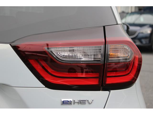 フィット ｅ：ＨＥＶリュクス　禁煙車　純正９インチナビ　バックカメラ　茶革ハーフレザー　シートヒーター　衝突軽減ブレーキ　アダクティブクルーズ　レーンキープ　純正１６インチアルミホイール　フルセグ　Ｂｌｕｅｔｏｏｔｈ接続　ＥＴＣ（13枚目）