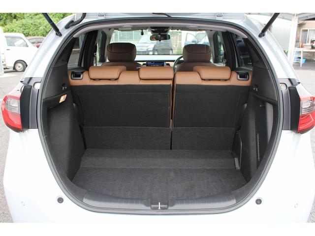 フィット ｅ：ＨＥＶリュクス　禁煙車　純正９インチナビ　バックカメラ　茶革ハーフレザー　シートヒーター　衝突軽減ブレーキ　アダクティブクルーズ　レーンキープ　純正１６インチアルミホイール　フルセグ　Ｂｌｕｅｔｏｏｔｈ接続　ＥＴＣ（15枚目）