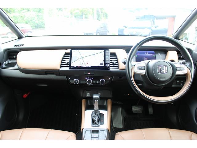 フィット ｅ：ＨＥＶリュクス　禁煙車　純正９インチナビ　バックカメラ　茶革ハーフレザー　シートヒーター　衝突軽減ブレーキ　アダクティブクルーズ　レーンキープ　純正１６インチアルミホイール　フルセグ　Ｂｌｕｅｔｏｏｔｈ接続　ＥＴＣ（18枚目）