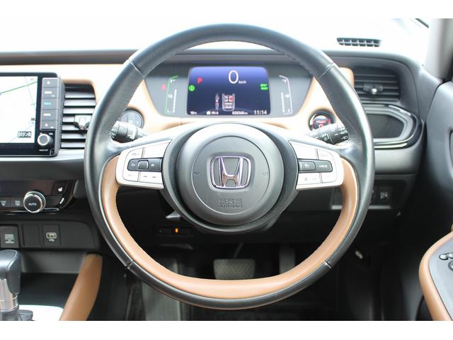 フィット ｅ：ＨＥＶリュクス　禁煙車　純正９インチナビ　バックカメラ　茶革ハーフレザー　シートヒーター　衝突軽減ブレーキ　アダクティブクルーズ　レーンキープ　純正１６インチアルミホイール　フルセグ　Ｂｌｕｅｔｏｏｔｈ接続　ＥＴＣ（19枚目）