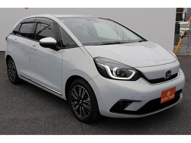 フィット ｅ：ＨＥＶリュクス　禁煙車　純正９インチナビ　バックカメラ　茶革ハーフレザー　シートヒーター　衝突軽減ブレーキ　アダクティブクルーズ　レーンキープ　純正１６インチアルミホイール　フルセグ　Ｂｌｕｅｔｏｏｔｈ接続　ＥＴＣ（21枚目）