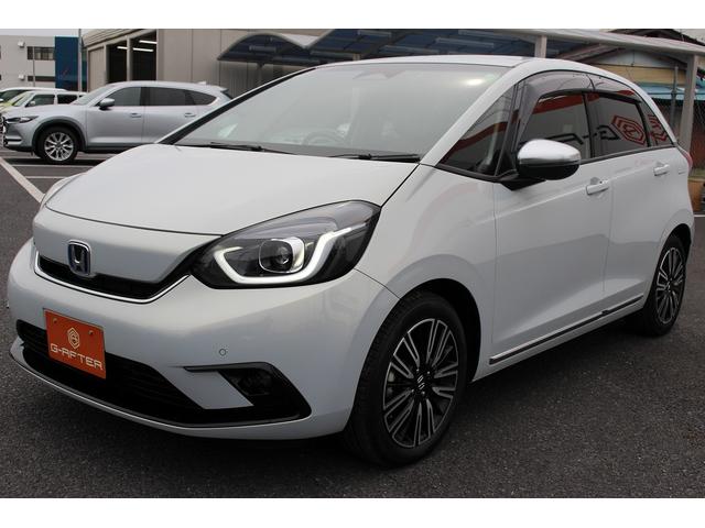 フィット ｅ：ＨＥＶリュクス　禁煙車　純正９インチナビ　バックカメラ　茶革ハーフレザー　シートヒーター　衝突軽減ブレーキ　アダクティブクルーズ　レーンキープ　純正１６インチアルミホイール　フルセグ　Ｂｌｕｅｔｏｏｔｈ接続　ＥＴＣ（24枚目）