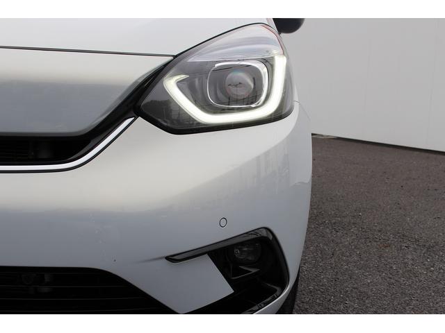 フィット ｅ：ＨＥＶリュクス　禁煙車　純正９インチナビ　バックカメラ　茶革ハーフレザー　シートヒーター　衝突軽減ブレーキ　アダクティブクルーズ　レーンキープ　純正１６インチアルミホイール　フルセグ　Ｂｌｕｅｔｏｏｔｈ接続　ＥＴＣ（26枚目）