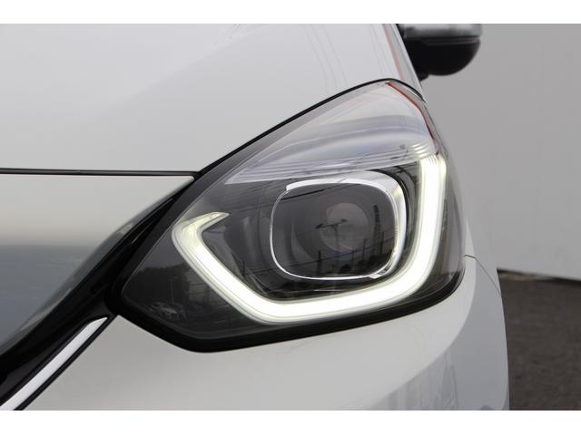 フィット ｅ：ＨＥＶリュクス　禁煙車　純正９インチナビ　バックカメラ　茶革ハーフレザー　シートヒーター　衝突軽減ブレーキ　アダクティブクルーズ　レーンキープ　純正１６インチアルミホイール　フルセグ　Ｂｌｕｅｔｏｏｔｈ接続　ＥＴＣ（27枚目）