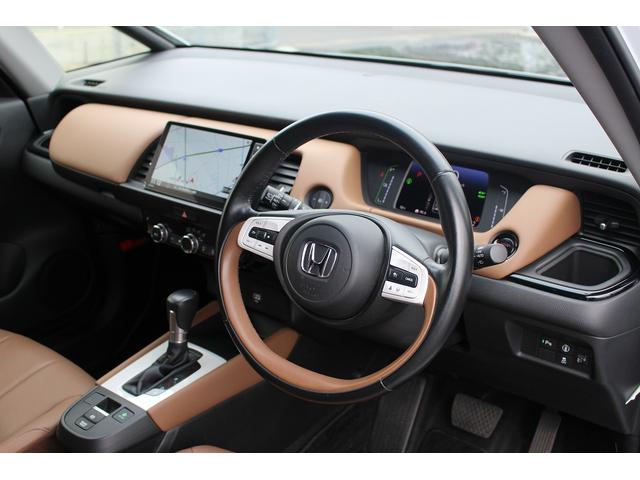 フィット ｅ：ＨＥＶリュクス　禁煙車　純正９インチナビ　バックカメラ　茶革ハーフレザー　シートヒーター　衝突軽減ブレーキ　アダクティブクルーズ　レーンキープ　純正１６インチアルミホイール　フルセグ　Ｂｌｕｅｔｏｏｔｈ接続　ＥＴＣ（40枚目）