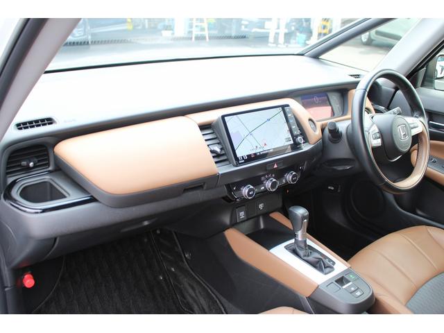 フィット ｅ：ＨＥＶリュクス　禁煙車　純正９インチナビ　バックカメラ　茶革ハーフレザー　シートヒーター　衝突軽減ブレーキ　アダクティブクルーズ　レーンキープ　純正１６インチアルミホイール　フルセグ　Ｂｌｕｅｔｏｏｔｈ接続　ＥＴＣ（42枚目）