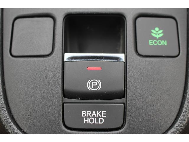 フィット ｅ：ＨＥＶリュクス　禁煙車　純正９インチナビ　バックカメラ　茶革ハーフレザー　シートヒーター　衝突軽減ブレーキ　アダクティブクルーズ　レーンキープ　純正１６インチアルミホイール　フルセグ　Ｂｌｕｅｔｏｏｔｈ接続　ＥＴＣ（50枚目）