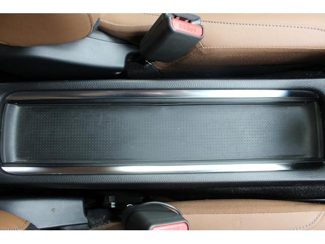 フィット ｅ：ＨＥＶリュクス　禁煙車　純正９インチナビ　バックカメラ　茶革ハーフレザー　シートヒーター　衝突軽減ブレーキ　アダクティブクルーズ　レーンキープ　純正１６インチアルミホイール　フルセグ　Ｂｌｕｅｔｏｏｔｈ接続　ＥＴＣ（65枚目）