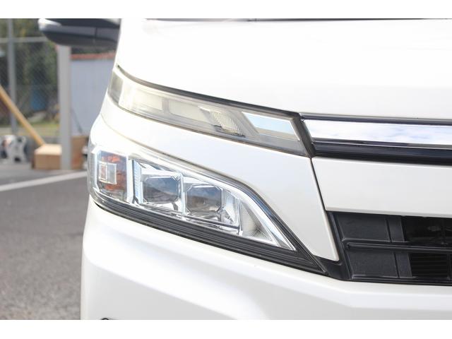ヴォクシー ハイブリッドＸ　後期型　禁煙車　純正７インチナビ　バックカメラ　両側電動スライドドア　オートクルーズコントロール　ビルトインＥＴＣ　フルセグＴＶ　純正１５インチアルミホイール　衝突軽減ブレーキオートマチックハイビーム（12枚目）
