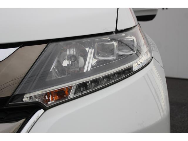 オデッセイハイブリッド ハイブリッド・ホンダセンシング 禁煙車 両側電動スライドドア フルセグTV 運転席パワーシート ビルトインETC バックカメラ プラズマクラスター付きオートエアコン 革巻きステアリング Bluetooth接続 LEDヘッド・フォグ(14枚目)
