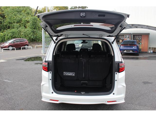 オデッセイハイブリッド ハイブリッド・ホンダセンシング 禁煙車 両側電動スライドドア フルセグTV 運転席パワーシート ビルトインETC バックカメラ プラズマクラスター付きオートエアコン 革巻きステアリング Bluetooth接続 LEDヘッド・フォグ(27枚目)