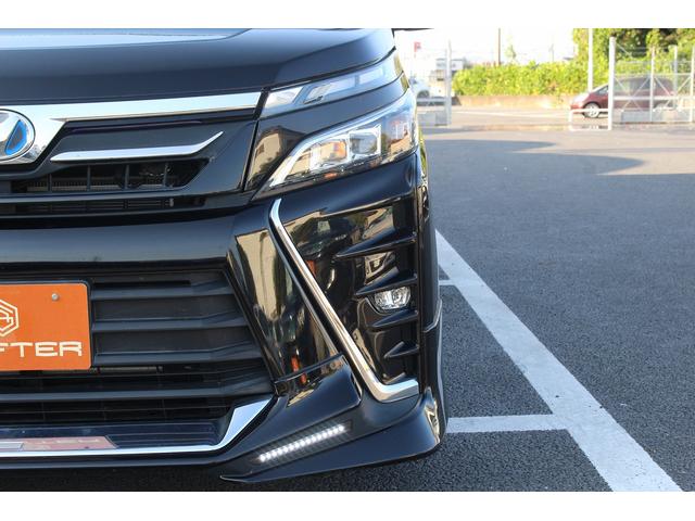 ヴォクシー ハイブリッドZS 後期型 禁煙車 純正10インチナビ フルセグ TRDフルエアロ バックモニター 両側電動スライド シートヒーター ビルトインETC 衝突軽減ブレーキ オートクルーズコントロール 純正AW(23枚目)