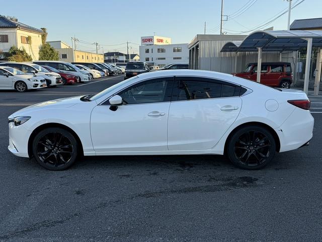 アテンザセダン ２５Ｓ　Ｌパッケージ　禁煙車　白革シート　ＢＯＳＥサウンド　純正７インチナビ　フルセグ　バックカメラ　クルーズコントロール　ヘッドアップディスプレイ　シートヒーター　パワーシート　ＥＴＣ　アイドリングストップ（6枚目）