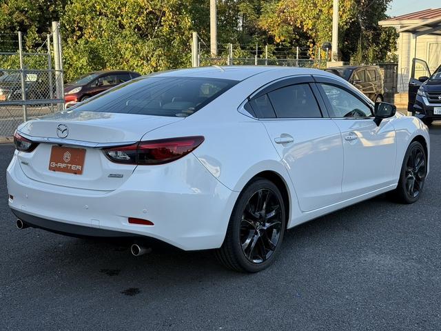 アテンザセダン ２５Ｓ　Ｌパッケージ　禁煙車　白革シート　ＢＯＳＥサウンド　純正７インチナビ　フルセグ　バックカメラ　クルーズコントロール　ヘッドアップディスプレイ　シートヒーター　パワーシート　ＥＴＣ　アイドリングストップ（18枚目）