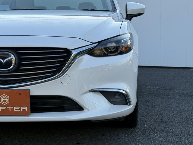 アテンザセダン ２５Ｓ　Ｌパッケージ　禁煙車　白革シート　ＢＯＳＥサウンド　純正７インチナビ　フルセグ　バックカメラ　クルーズコントロール　ヘッドアップディスプレイ　シートヒーター　パワーシート　ＥＴＣ　アイドリングストップ（21枚目）