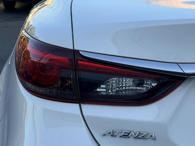 アテンザセダン ２５Ｓ　Ｌパッケージ　禁煙車　白革シート　ＢＯＳＥサウンド　純正７インチナビ　フルセグ　バックカメラ　クルーズコントロール　ヘッドアップディスプレイ　シートヒーター　パワーシート　ＥＴＣ　アイドリングストップ（24枚目）