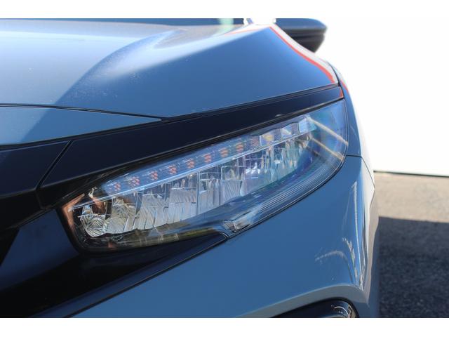 シビック ハッチバック　禁煙車　サンルーフ　ＯＰ本革シート　純正ナビ　フルセグ　バックカメラ　パワーシート　衝突軽減ブレーキシステム　アダクティブクルーズ　ブレーキホールド　パドルシフト　シートヒーター　スポーツアルミペダル（11枚目）