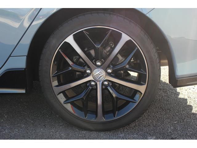 シビック ハッチバック　禁煙車　サンルーフ　ＯＰ本革シート　純正ナビ　フルセグ　バックカメラ　パワーシート　衝突軽減ブレーキシステム　アダクティブクルーズ　ブレーキホールド　パドルシフト　シートヒーター　スポーツアルミペダル（22枚目）