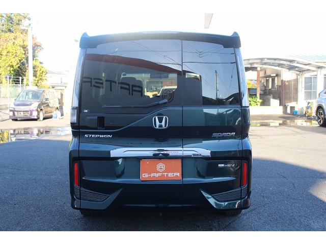 ステップワゴンスパーダ ｅ：ＨＥＶスパーダ　Ｇ・ＥＸ　ホンダセンシング　禁煙車　社外９インチナビ　フルセグ　アラウンドビューカメラ　ホンダセンシング　両側電動スライドドア　シートヒーター　アダプティブクルーズコントロール　ビルドインＥＴＣ２．０　ハーフレザー　純正１６ＡＷ（10枚目）