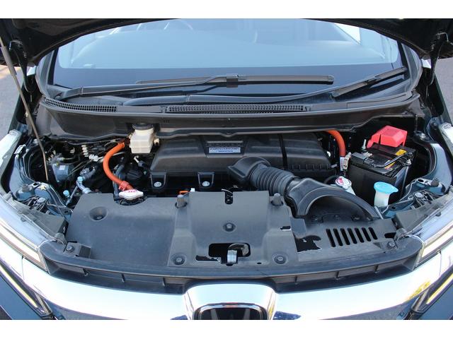 ステップワゴンスパーダ ｅ：ＨＥＶスパーダ　Ｇ・ＥＸ　ホンダセンシング　禁煙車　社外９インチナビ　フルセグ　アラウンドビューカメラ　ホンダセンシング　両側電動スライドドア　シートヒーター　アダプティブクルーズコントロール　ビルドインＥＴＣ２．０　ハーフレザー　純正１６ＡＷ（21枚目）