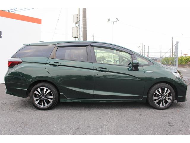 シャトル ハイブリッドＸ　ホンダセンシング　禁煙車　メーカーＯＰ８型ナビ　フルセグ　バックカメラ　ハーフレザー　アダクティブクルーズコントロール　衝突軽減　シートヒーター　純正１５インチＡＷ　ＥＴＣ　レーンアシスト　Ｂｌｕｅｔｏｏｔｈ接続（9枚目）