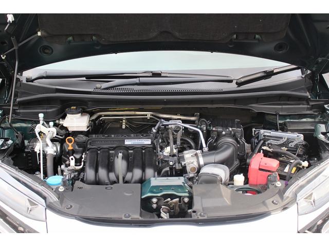 シャトル ハイブリッドＸ　ホンダセンシング　禁煙車　メーカーＯＰ８型ナビ　フルセグ　バックカメラ　ハーフレザー　アダクティブクルーズコントロール　衝突軽減　シートヒーター　純正１５インチＡＷ　ＥＴＣ　レーンアシスト　Ｂｌｕｅｔｏｏｔｈ接続（20枚目）