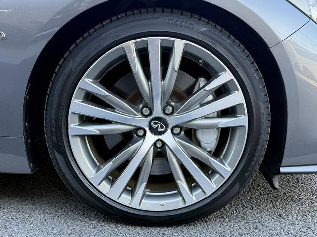 スカイライン 350GT ハイブリッド タイプSP 禁煙車 ワンオーナー メーカー8インチナビ アラウンドビューカメラ 黒革シート フルセグ 衝突軽減ブレーキ シートヒーター パワーシート ビルドインETC アダプティブクルーズコントロール 後側方支援(14枚目)