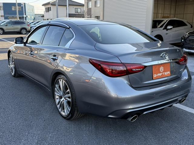 スカイライン 350GT ハイブリッド タイプSP 禁煙車 ワンオーナー メーカー8インチナビ アラウンドビューカメラ 黒革シート フルセグ 衝突軽減ブレーキ シートヒーター パワーシート ビルドインETC アダプティブクルーズコントロール 後側方支援(23枚目)