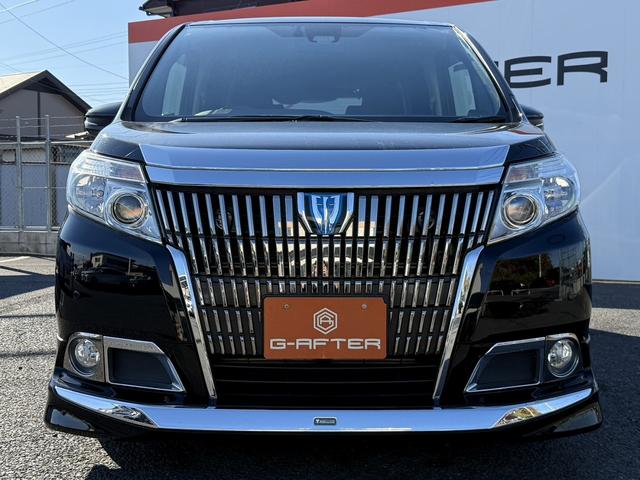 エスクァイア ハイブリッドXi 禁煙車 メーカー12インチ後席モニター メーカー10インチナビ フルセグ バックカメラ モデリスタフロントエアロ 衝突軽減ブレーキ ビルトインETC クルーズコントロール レーンキープ シートヒーター(3枚目)