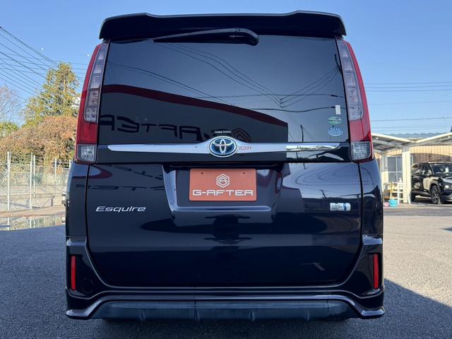 エスクァイア ハイブリッドGi 禁煙車 メーカー11インチ後席モニター 純正8型ナビ 両側電動スライドドア フルセグ バックカメラ 黒革シート シートヒーター ビルトインETC 置くだけ充電 純正15インチアルミホイール LED(10枚目)