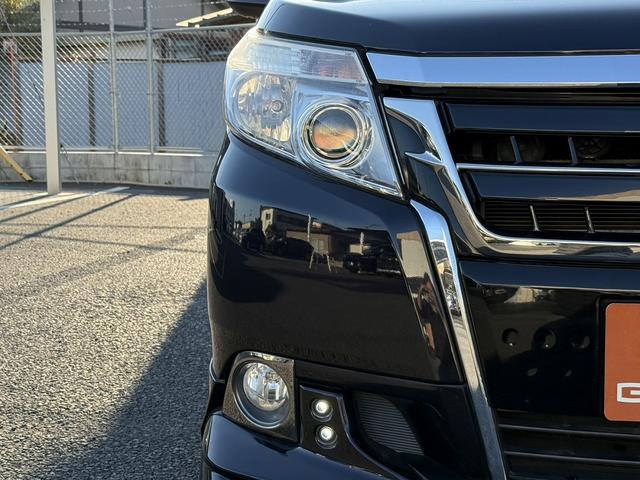 エスクァイア ハイブリッドGi 禁煙車 メーカー11インチ後席モニター 純正8型ナビ 両側電動スライドドア フルセグ バックカメラ 黒革シート シートヒーター ビルトインETC 置くだけ充電 純正15インチアルミホイール LED(26枚目)