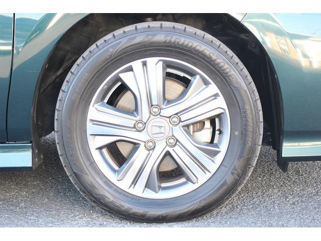 ステップワゴンスパーダ スパーダハイブリッド G ホンダセンシング 後期型 純正9インチナビ 後席モニター フルセグ バックカメラ 両側電動スライドドア 衝突軽減ブレーキ 運転支援システム レーダークルーズコントロール USB端子 標識認識システム 逸脱警報(14枚目)