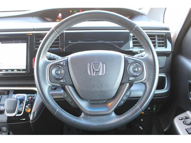 ステップワゴンスパーダ スパーダハイブリッド G ホンダセンシング 後期型 純正9インチナビ 後席モニター フルセグ バックカメラ 両側電動スライドドア 衝突軽減ブレーキ 運転支援システム レーダークルーズコントロール USB端子 標識認識システム 逸脱警報(19枚目)