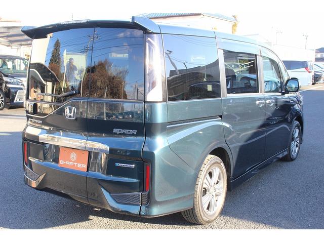 ステップワゴンスパーダ スパーダハイブリッド G ホンダセンシング 後期型 純正9インチナビ 後席モニター フルセグ バックカメラ 両側電動スライドドア 衝突軽減ブレーキ 運転支援システム レーダークルーズコントロール USB端子 標識認識システム 逸脱警報(22枚目)