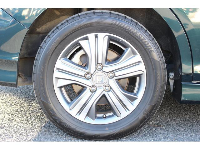 ステップワゴンスパーダ スパーダハイブリッド G ホンダセンシング 後期型 純正9インチナビ 後席モニター フルセグ バックカメラ 両側電動スライドドア 衝突軽減ブレーキ 運転支援システム レーダークルーズコントロール USB端子 標識認識システム 逸脱警報(31枚目)