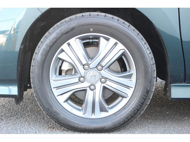 ステップワゴンスパーダ スパーダハイブリッド G ホンダセンシング 後期型 純正9インチナビ 後席モニター フルセグ バックカメラ 両側電動スライドドア 衝突軽減ブレーキ 運転支援システム レーダークルーズコントロール USB端子 標識認識システム 逸脱警報(33枚目)