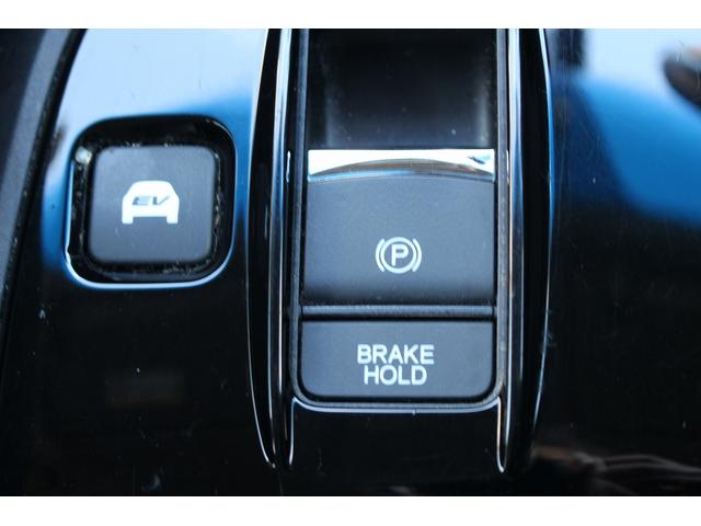 ステップワゴンスパーダ スパーダハイブリッド G ホンダセンシング 後期型 純正9インチナビ 後席モニター フルセグ バックカメラ 両側電動スライドドア 衝突軽減ブレーキ 運転支援システム レーダークルーズコントロール USB端子 標識認識システム 逸脱警報(67枚目)